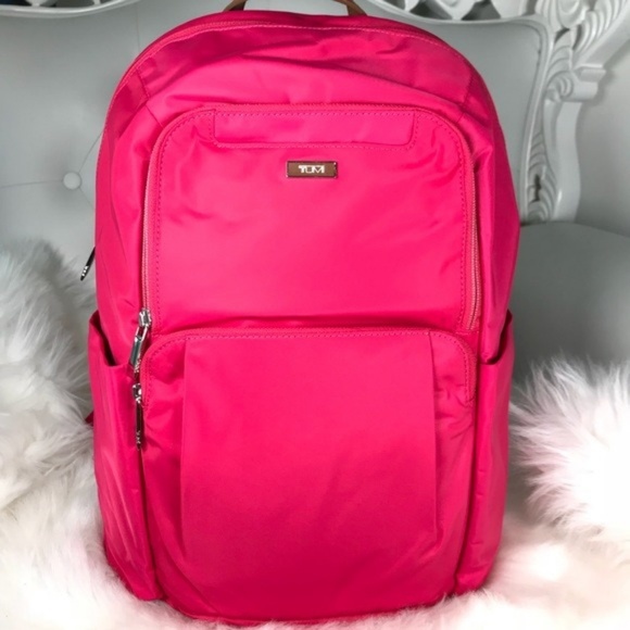 pink tumi backpack
